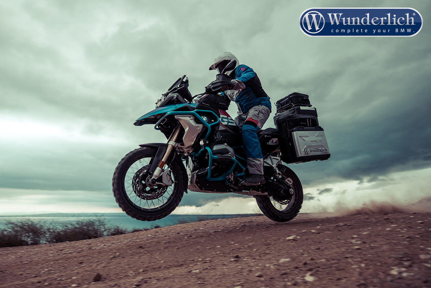 This high-quality black handlebar central support from Wunderlich made of aluminium is 300 mm long with a diameter of 12 mm.