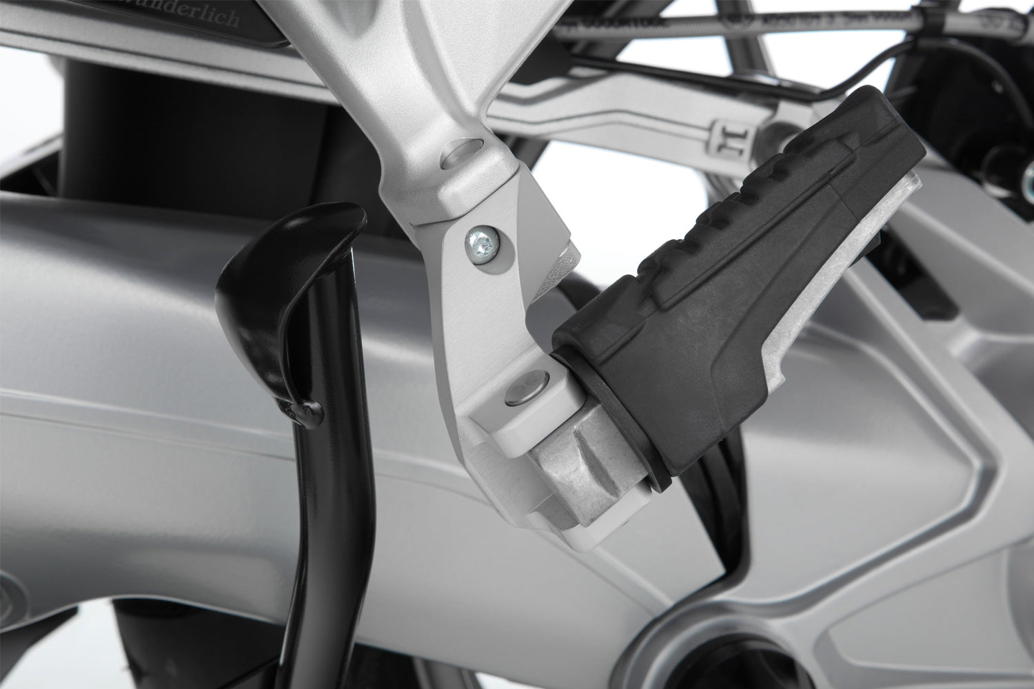 The Wunderlich lowering set will move the footrest down and slightly forward.
