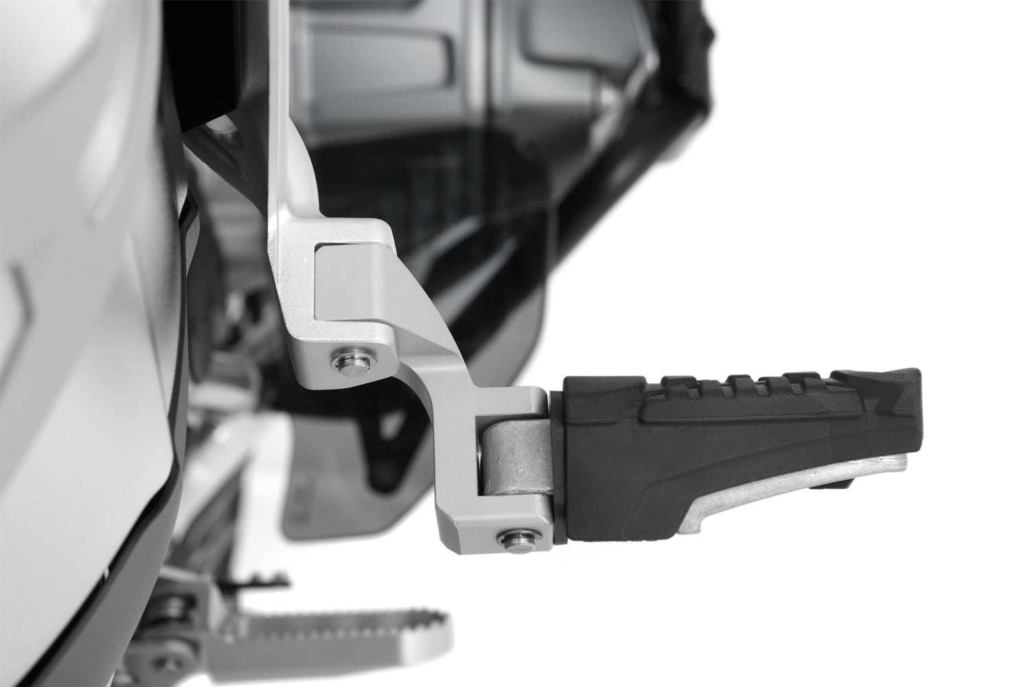 The Wunderlich lowering set will move the footrest down and slightly forward.