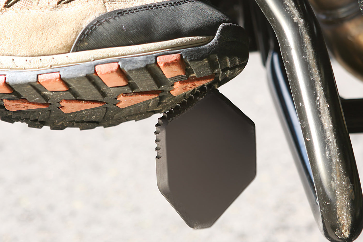A BMW GS supported on the side stand can easily get bogged down.The Wunderlich sidestand enlarger eliminates this risk.