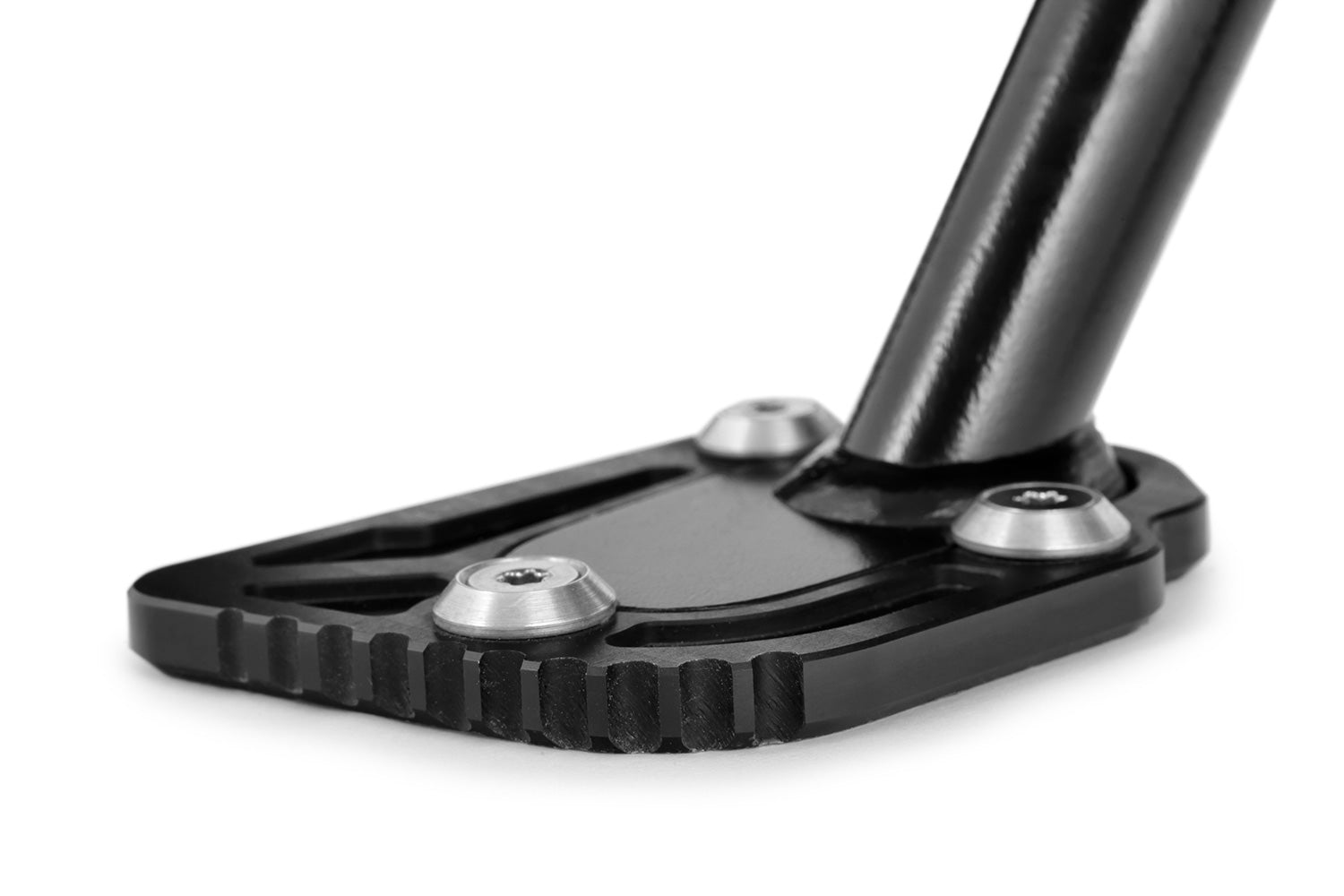 A precisely machined extension plate that can quickly be bolted to the side stand eliminates this risk.