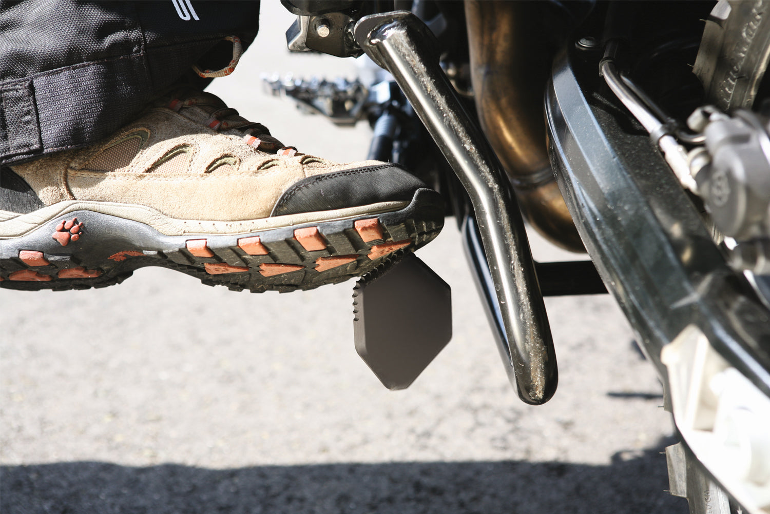 A precisely machined extension plate that can quickly be bolted to the side stand eliminates this risk.