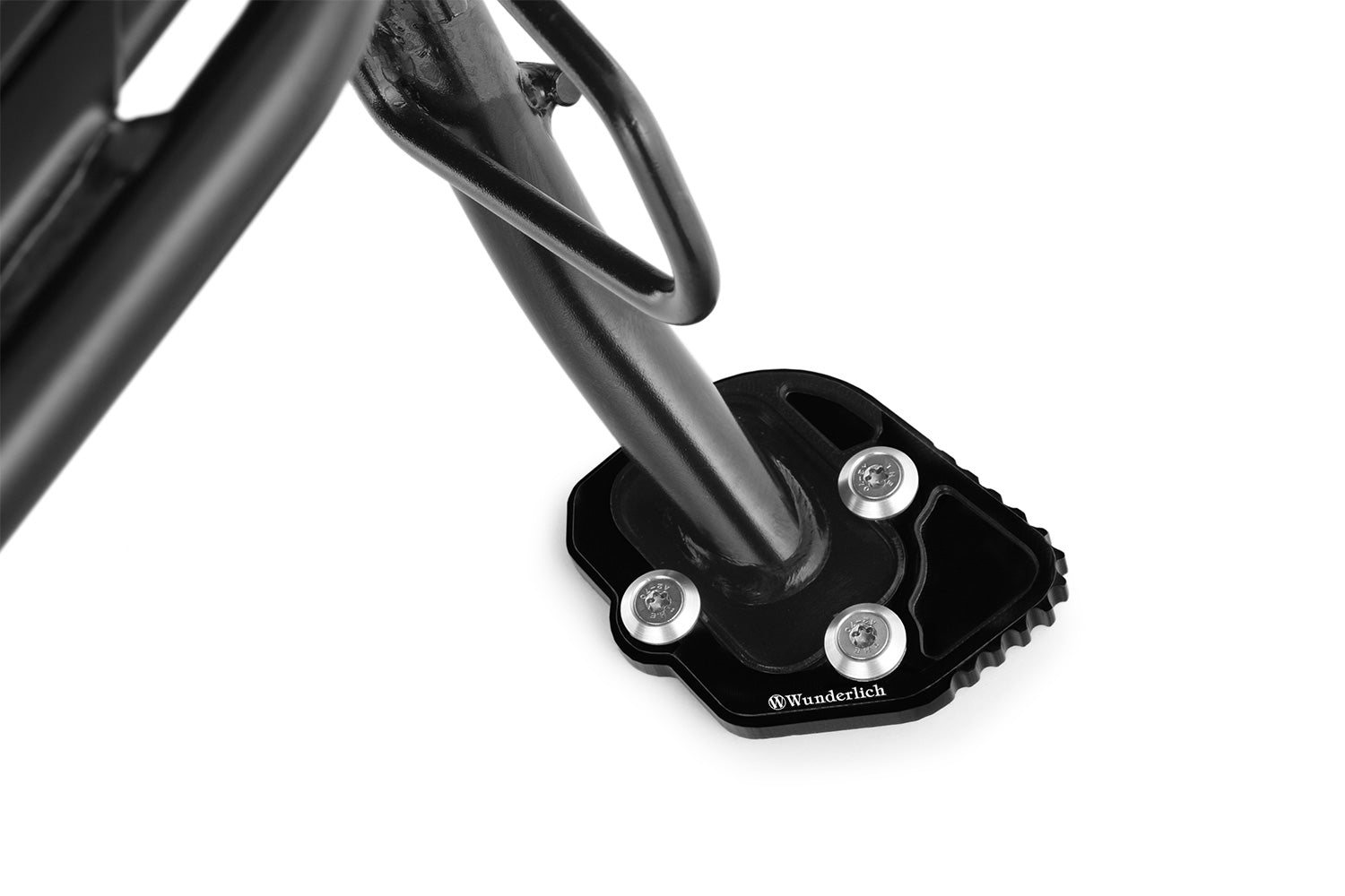 A precisely milled enlarger that can be quickly screwed onto the side stand effectively eliminates this design flaw
