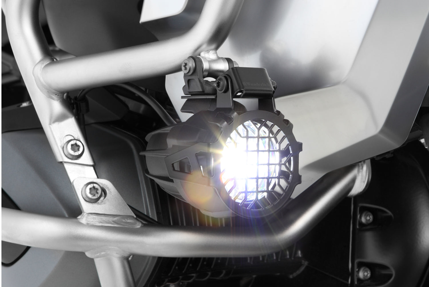 Wunderlich auxiliary light protection grille for BMW R 1200 GS LC protects even from violent impacts.