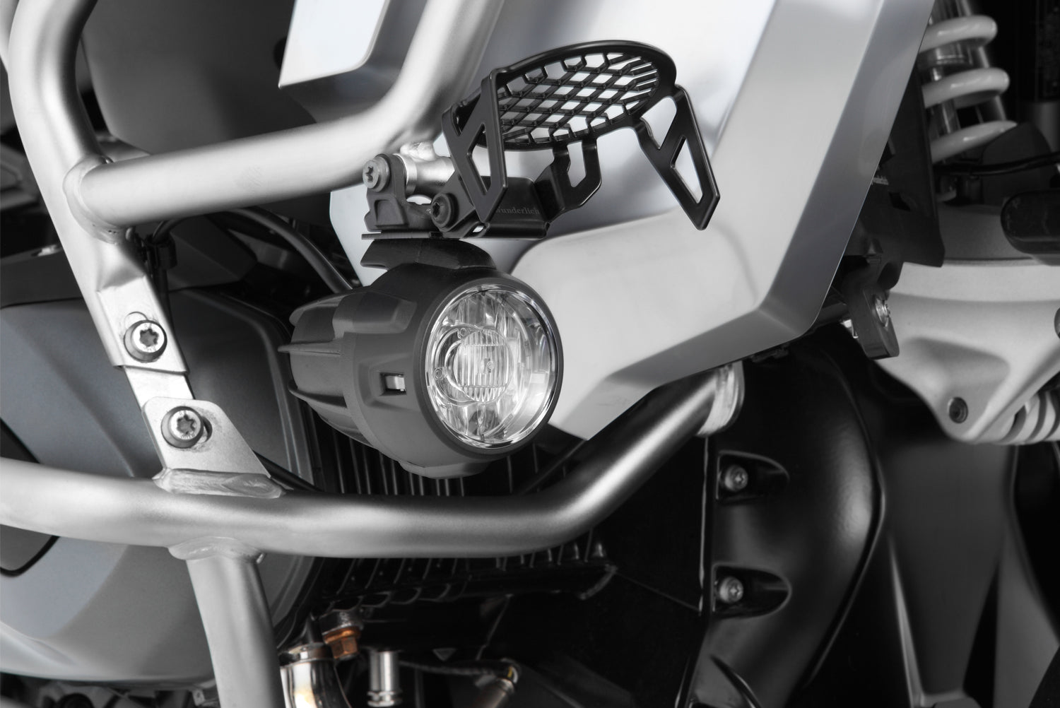 Wunderlich auxiliary light protection grille for BMW R 1200 GS LC protects even from violent impacts.
