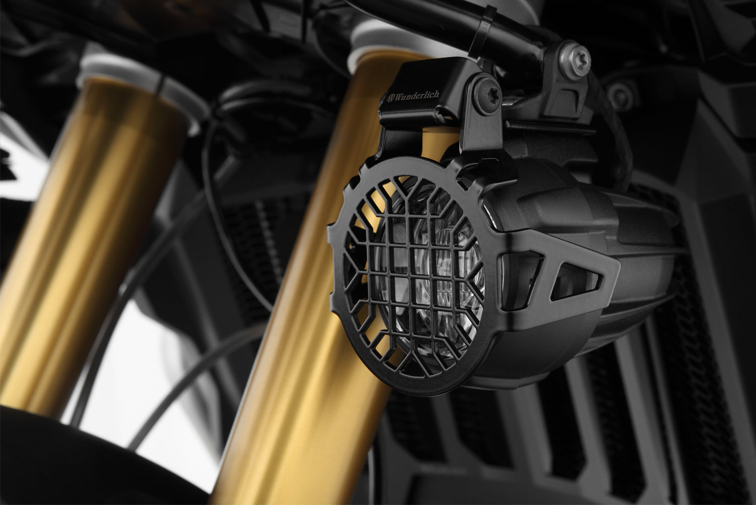 Wunderlich auxiliary light protection grille for BMW R 1200 GS LC protects even from violent impacts.