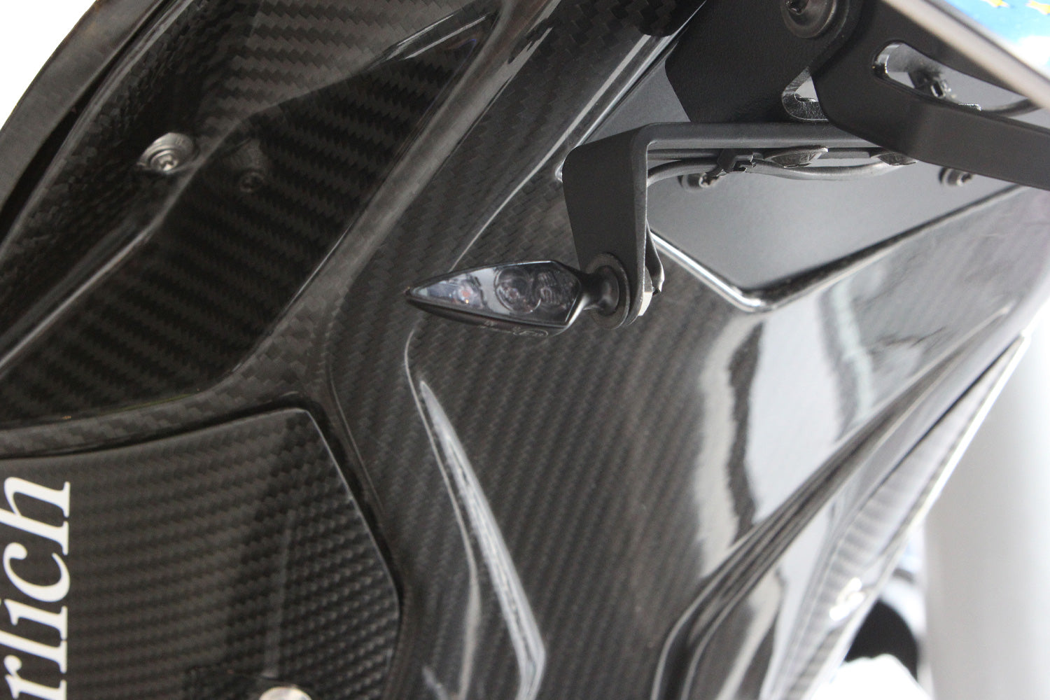 The set includes two high-quality indicator brackets made of black anodised aluminium