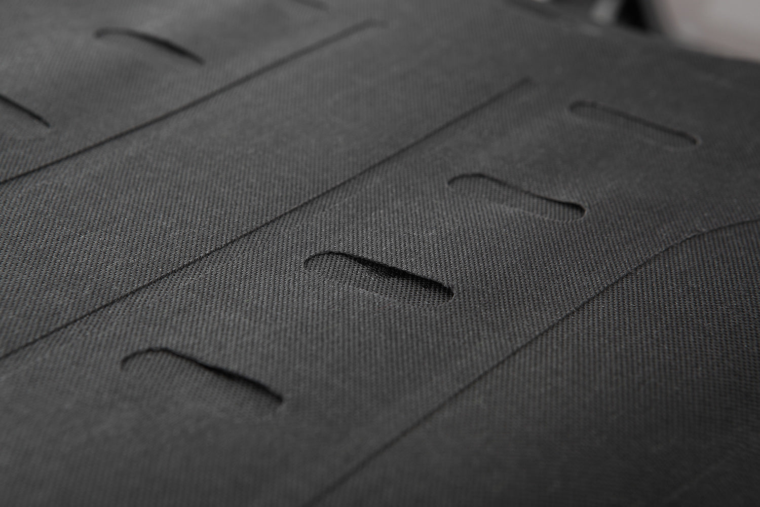 Multi-functional and compact bag can either be attached to the luggage carrier of the passenger seat quickly and simply