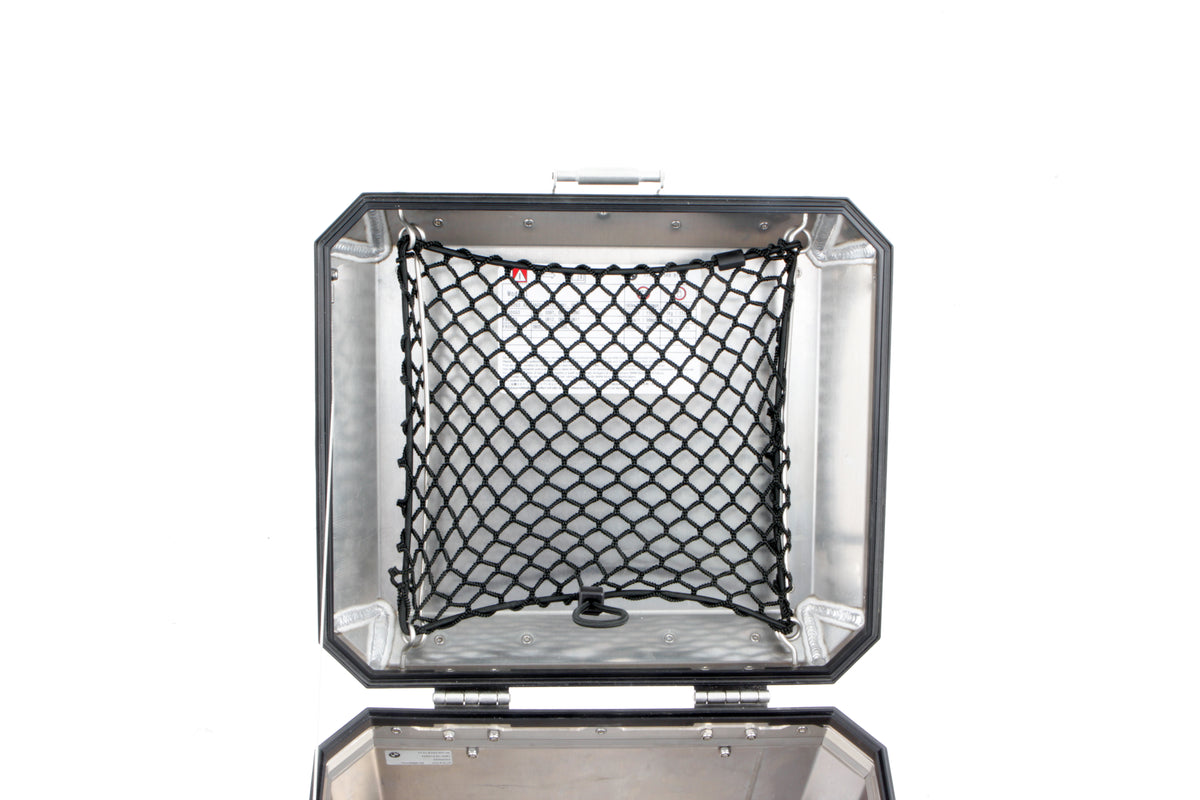 You can store additional luggage in the cover of the original aluminium topcase and have it ready to hand right after opening