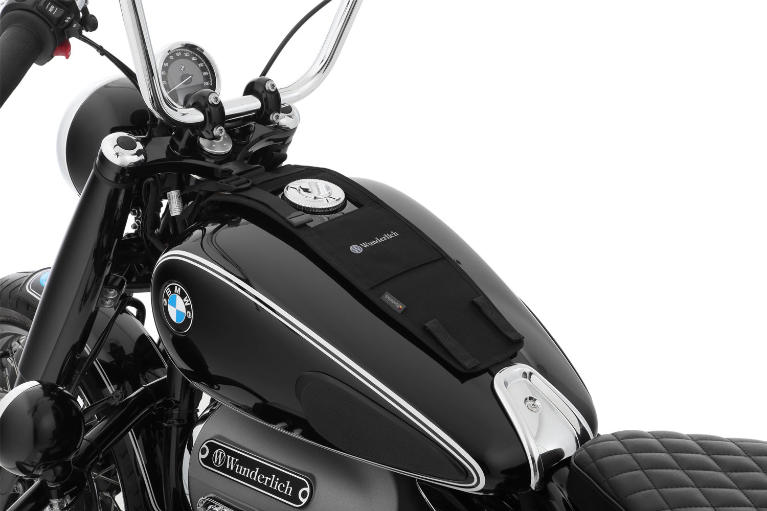 The mounting system is attached to the vehicle with minimal hand pressure and the tank bag can be quickly fastened to it. 