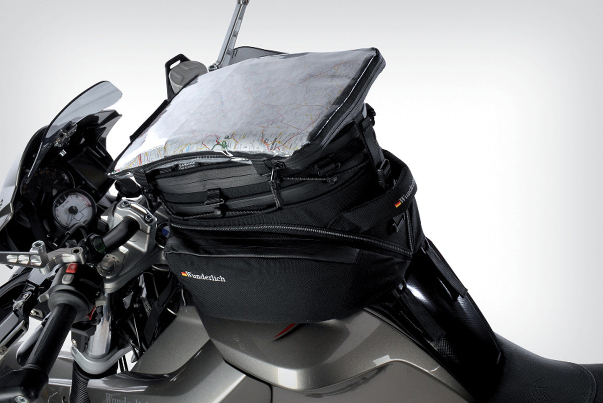 The mounting system is attached to the vehicle with minimal hand pressure and the tank bag can be quickly fastened to it.