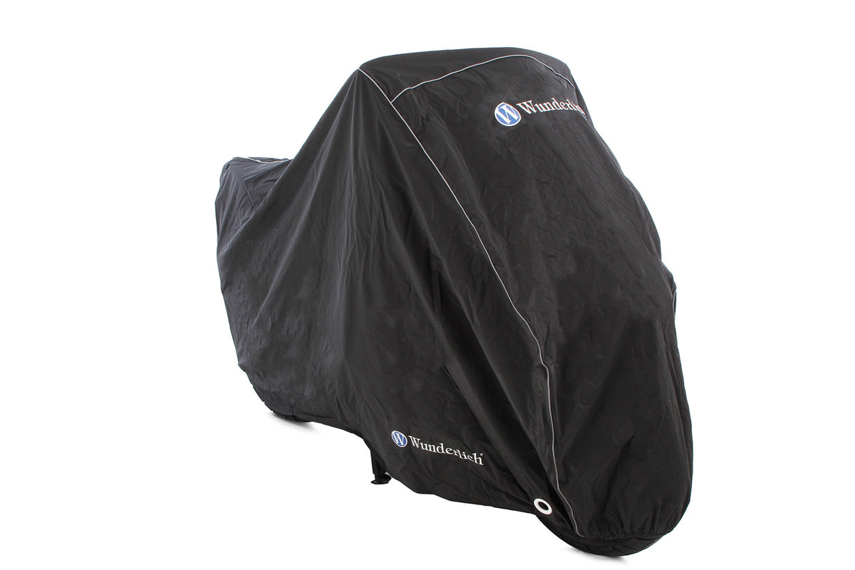 This exclusive outdoor tarpaulin is customised to fit your model.