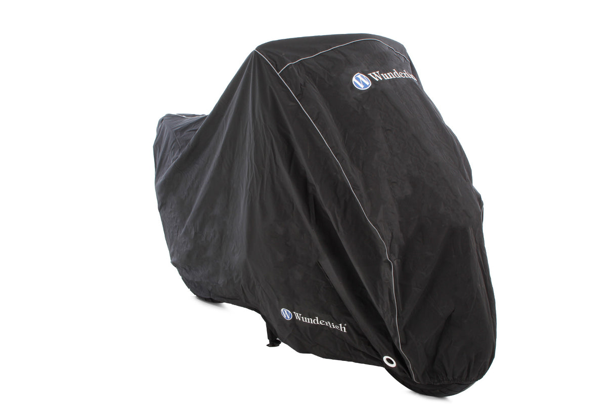 This exclusive outdoor tarpaulin is customised to fit your model.