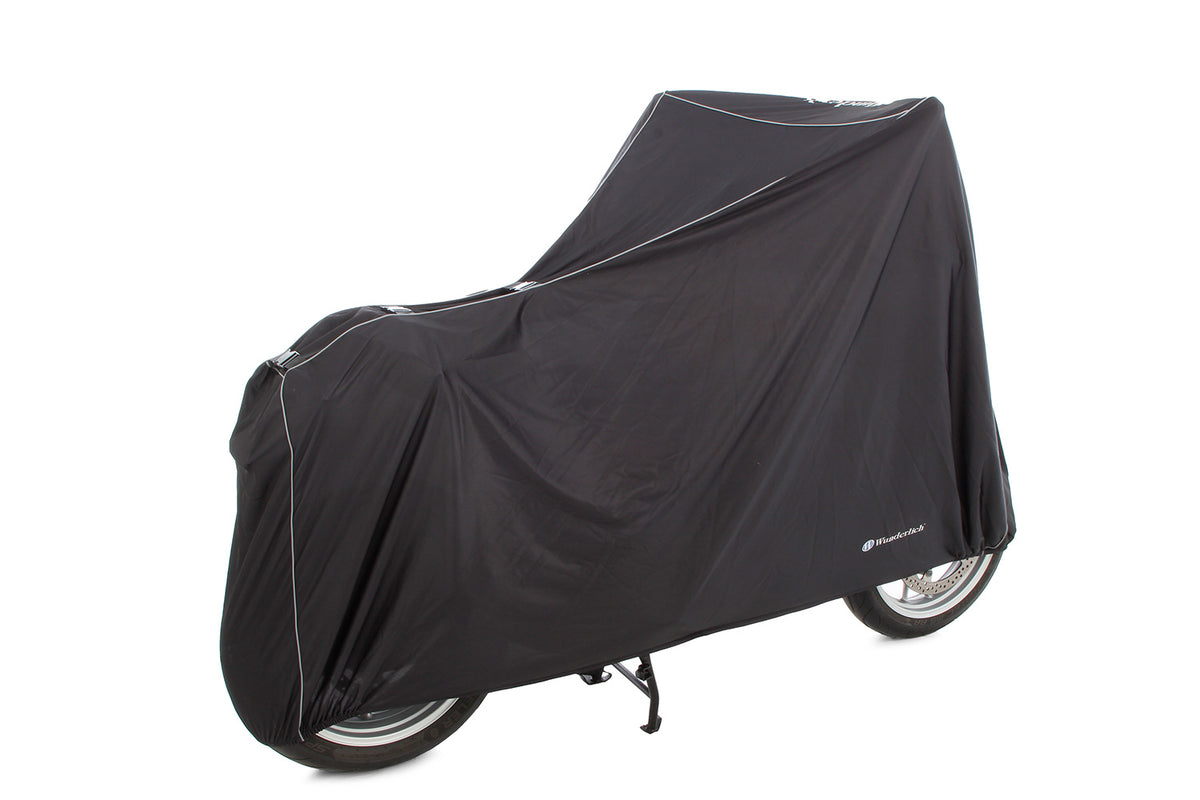 This exclusive tarpaulin is customised to fit your model.
