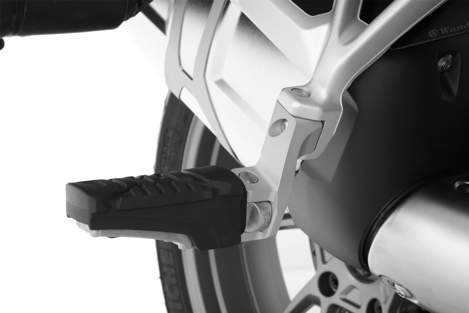 The Wunderlich lowering set will move the footrest down and slightly forward.