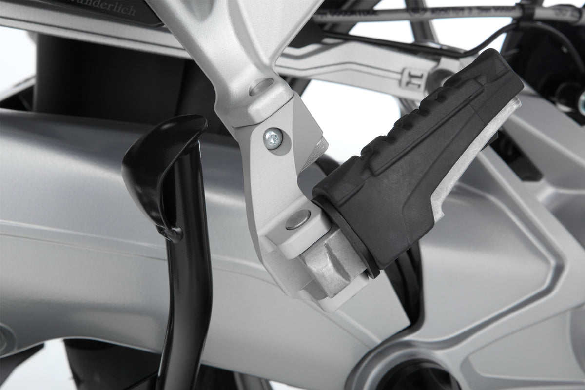 The Wunderlich lowering set will move the footrest down and slightly forward.