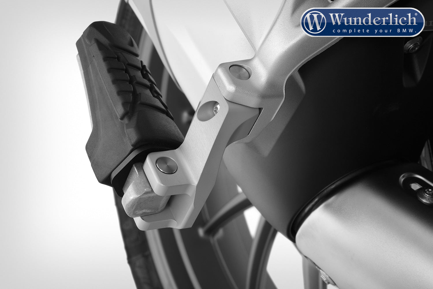 The Wunderlich lowering set will move the footrest down and slightly forward.