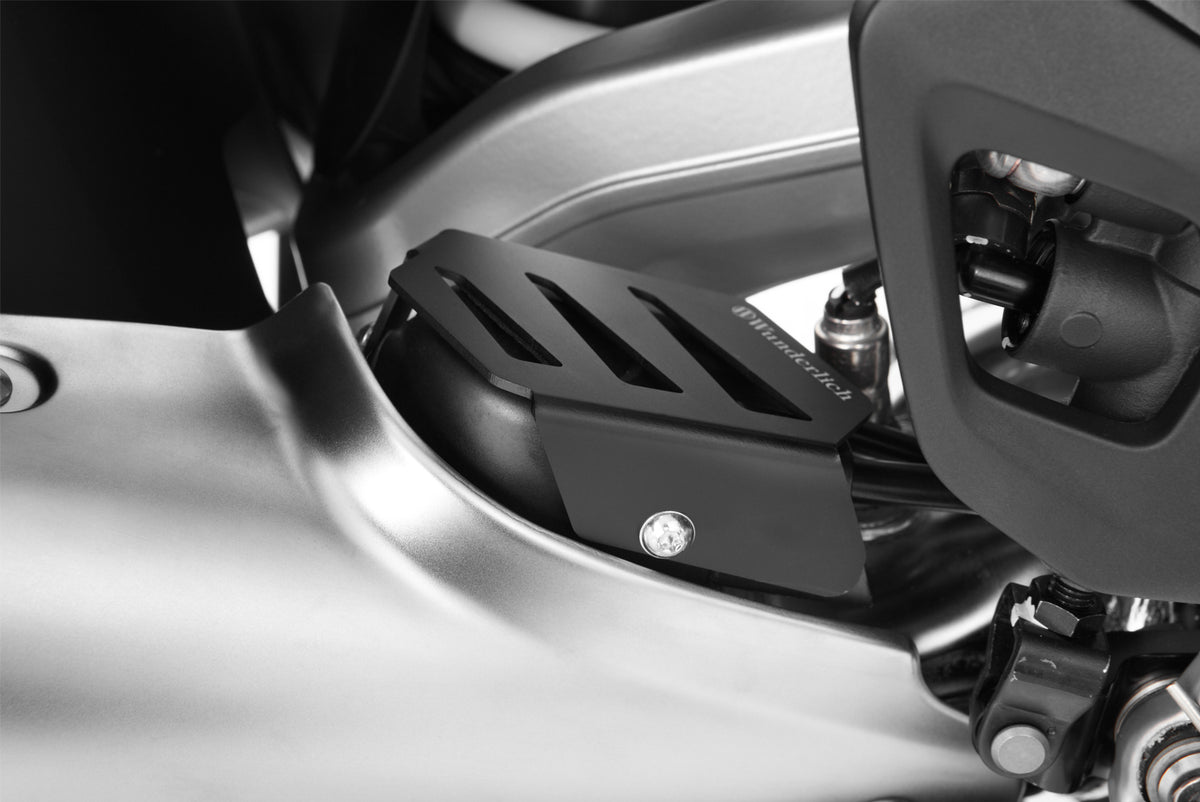 Damage from stones and accidental boot damage can no longer occur with this Wunderlich Exhaust flap cover.