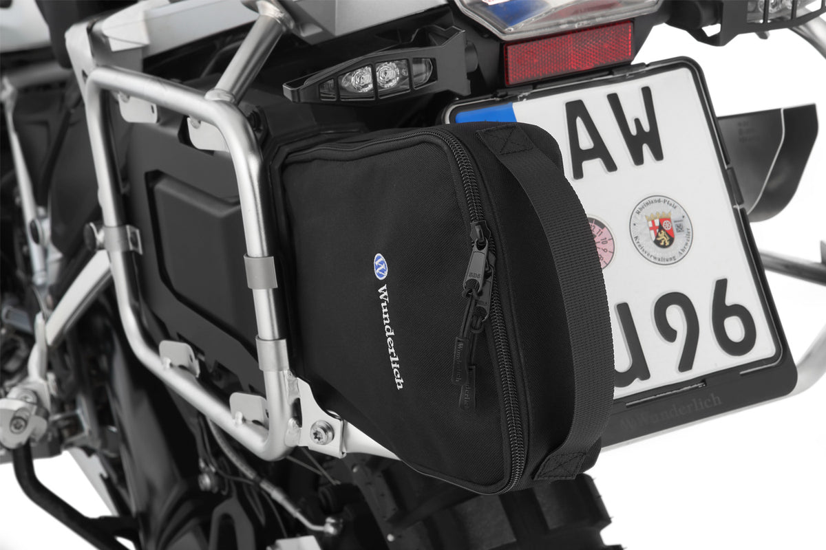 Tailored tool box for various bits and pieces  - Space-saving, integrated mounting on the left of the original case carrier!