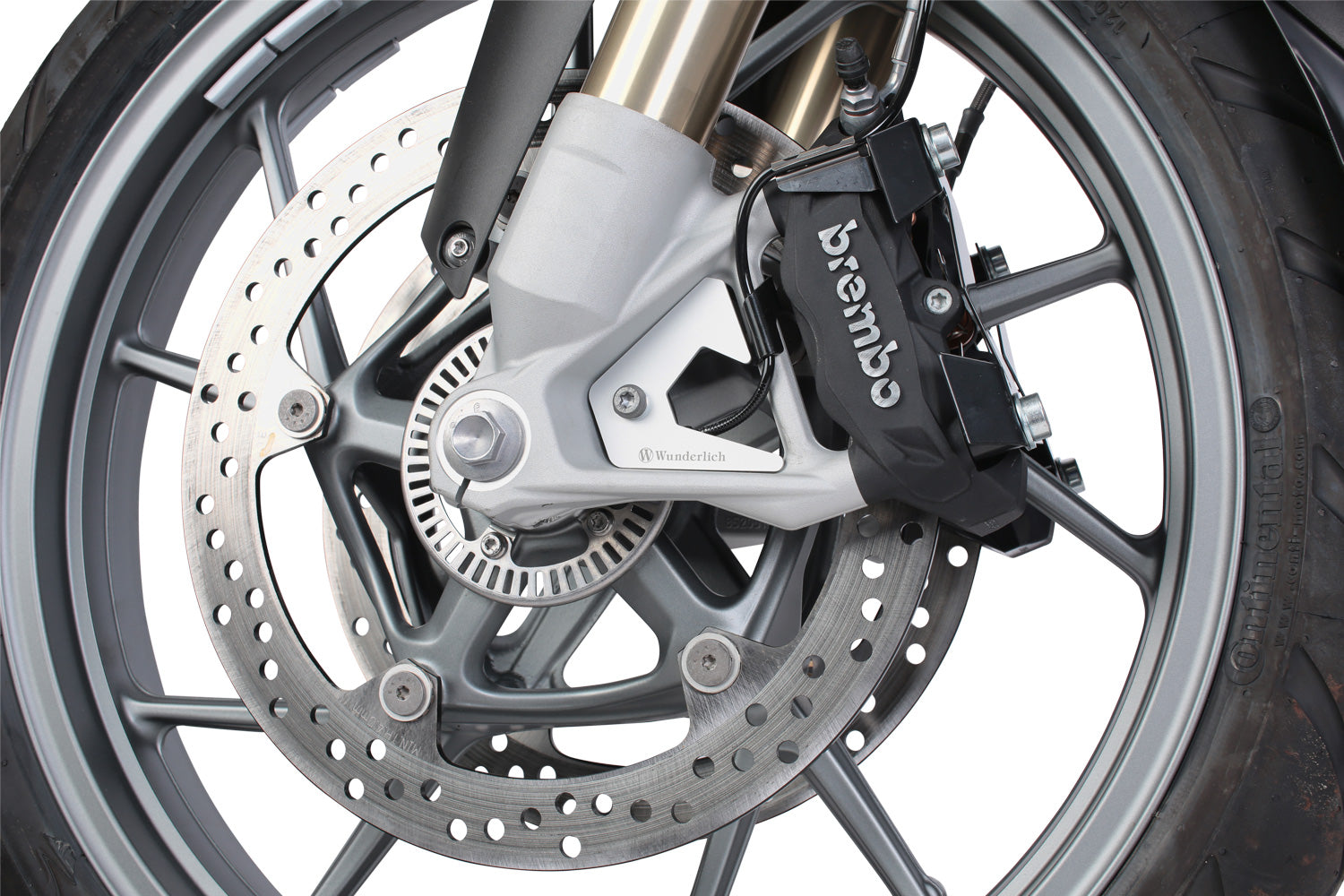 Wunderlich ABS sensor protection; this ABS sensor cover closes the gaps between the brake calliper and front wheel bearings.