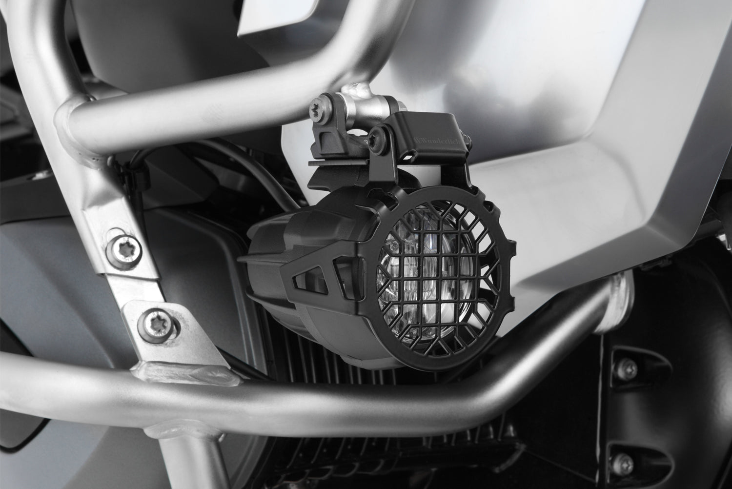 Wunderlich auxiliary light protection grille for BMW R 1200 GS LC  protects even from violent impacts.
