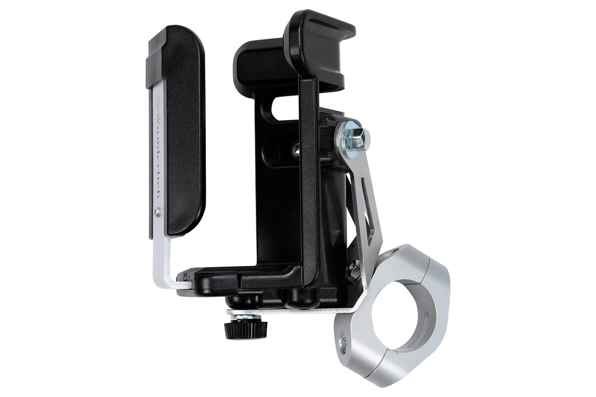 Adjustable drinks holder for bottles with a diameter of 52 to 67 mm.