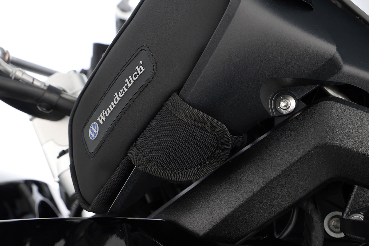Two functional, cleverly arranged bags - designed specifically to fit the wind deflectors