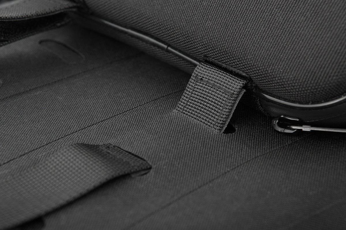 Multi-functional and compact bag can  either be attached to the luggage carrier of the passenger seat quickly and  simply