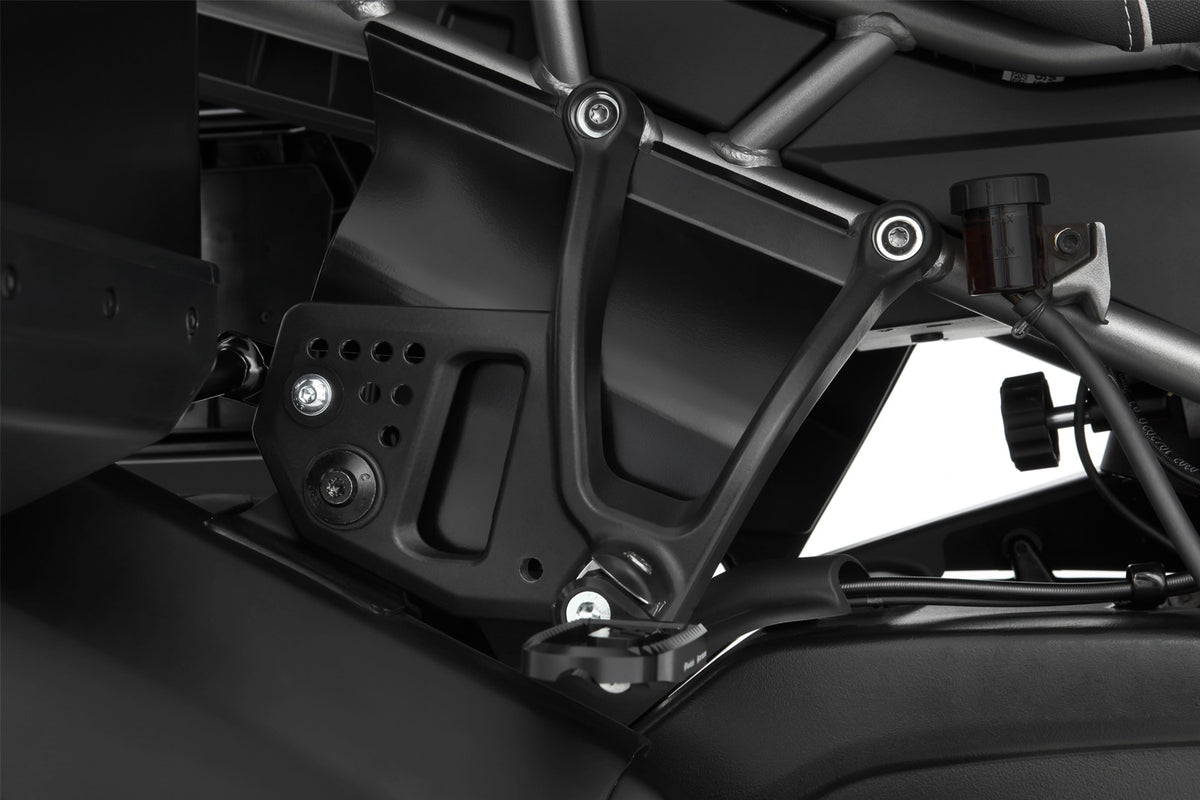 Reliably protects pillion rider's legs and feet from swirling spray and road debris on rainy rides, increasing comfort